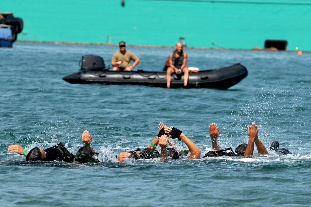Competitors Dive Into Action During Fuerzas Comando Aquatic Event