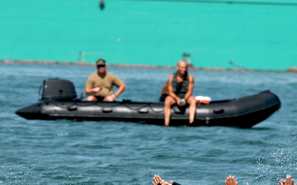 Competitors Dive Into Action During Fuerzas Comando Aquatic Event