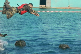 Competitors Dive Into Action During Fuerzas Comando Aquatic Event