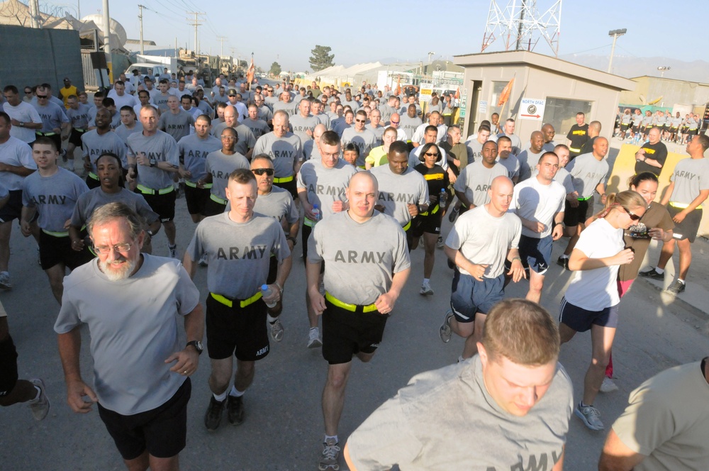 Runners at Bagram Airfield, Afghanistan Take Off to Compete in a Five-kilometer Race Held to Celebrate the 150th Birthday of the U.S. Army Signal Corps, June 21.