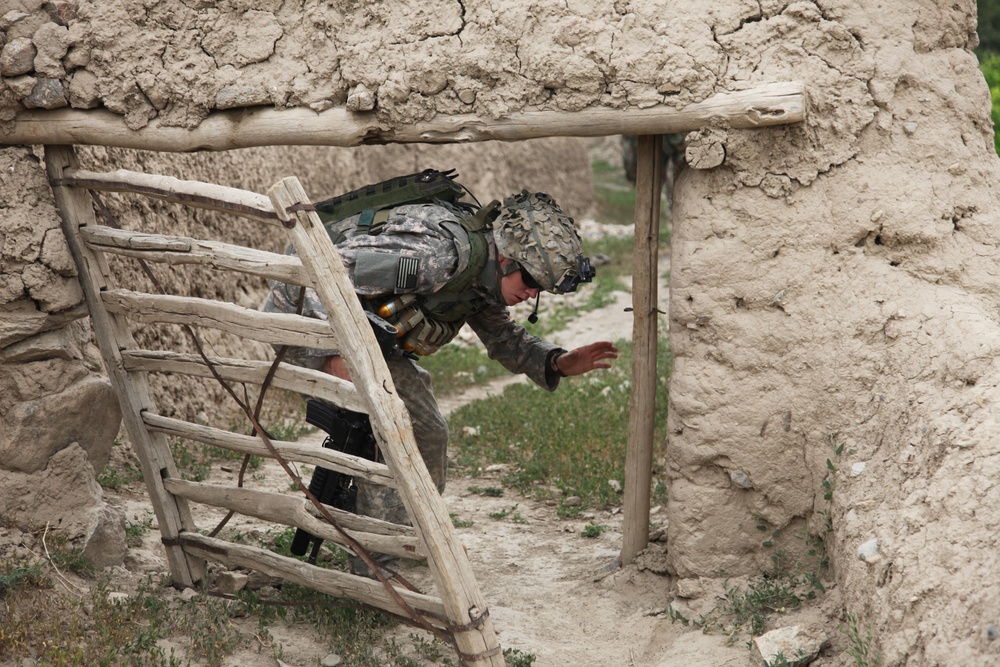 Soldiers patrol the Charkh Valley