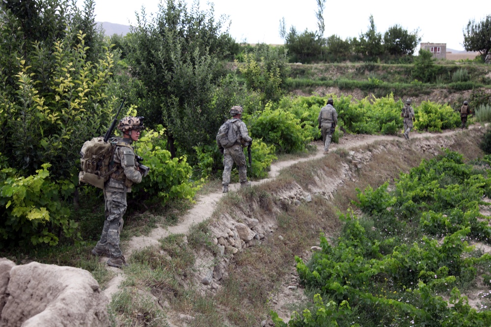 Soldiers patrol the Charkh Valley