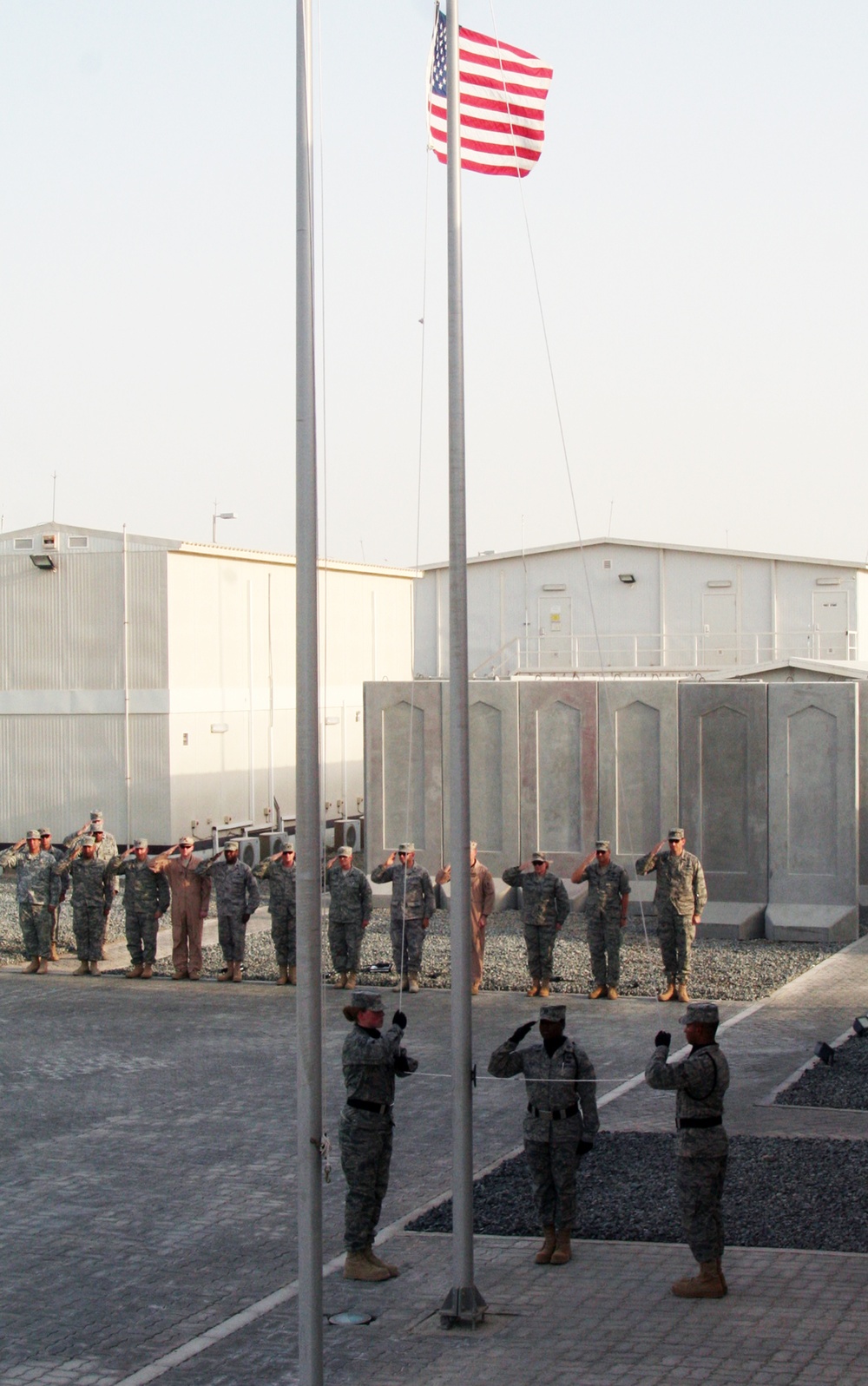 Deployed AWACS Airmen Lead Deployed Retreat Ceremony for 380th AEW