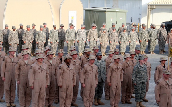 Deployed AWACS Airmen Lead Deployed Retreat Ceremony for 380th AEW