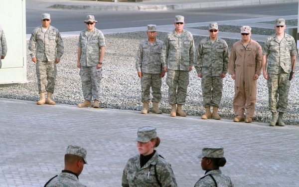 Deployed AWACS Airmen Lead Deployed Retreat Ceremony for 380th AEW