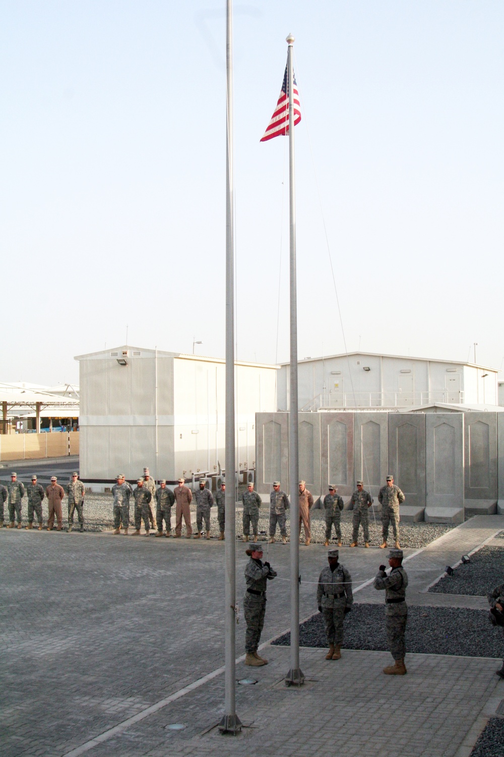 Deployed AWACS Airmen Lead Deployed Retreat Ceremony for 380th AEW