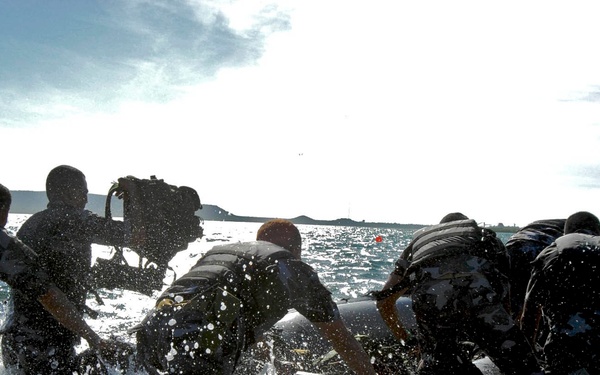 Fuerzas Comando Team Swim for Success During Aquatic Event