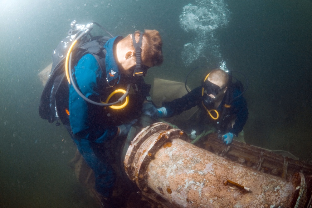 Navy Divers Work to Lift Sunken Engine Block