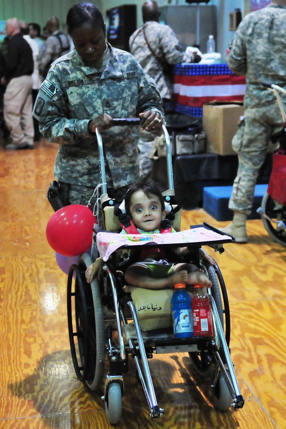 Volunteers from 1st AD provide wheelchairs to disabled Iraqi children