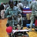 Volunteers from 1st AD provide wheelchairs to disabled Iraqi children