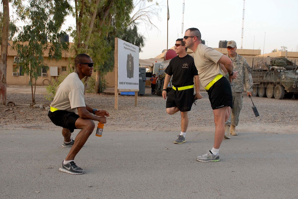 Soldiers in Baghdad run 12K to raise awareness for cause at home