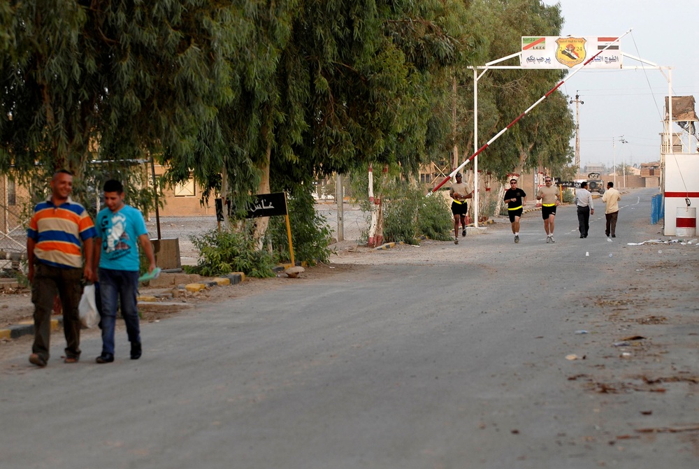 Soldiers in Baghdad run 12K to raise awareness for cause at home