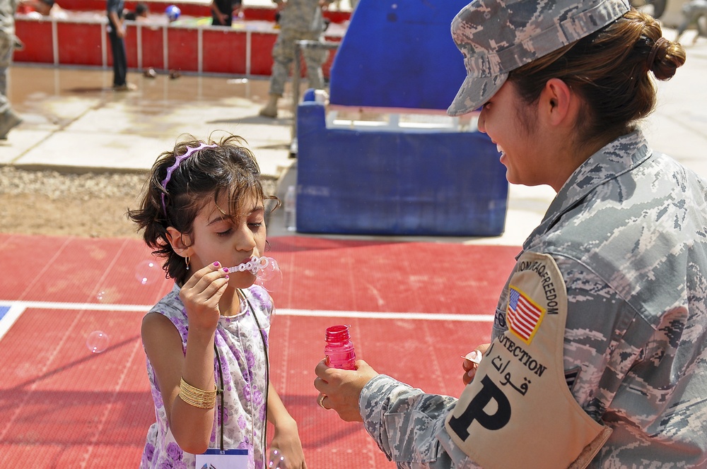 Iraqi kids play American games at Joint Base Balad