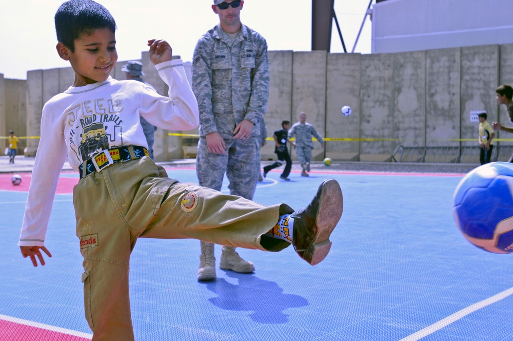 Iraqi kids play American games at Joint Base Balad