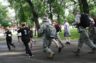 Minot families, Kosovo Soldiers Run 'Together' from Across the Ocean