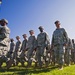 Soldiers of the 205th Infantry Brigade, First Army Division East march off the field after the brigade's change-of-command ceremony held at the Veteran's Memorial, Camp Atterbury Joint Maneuver Training Center in central Indiana June 30.