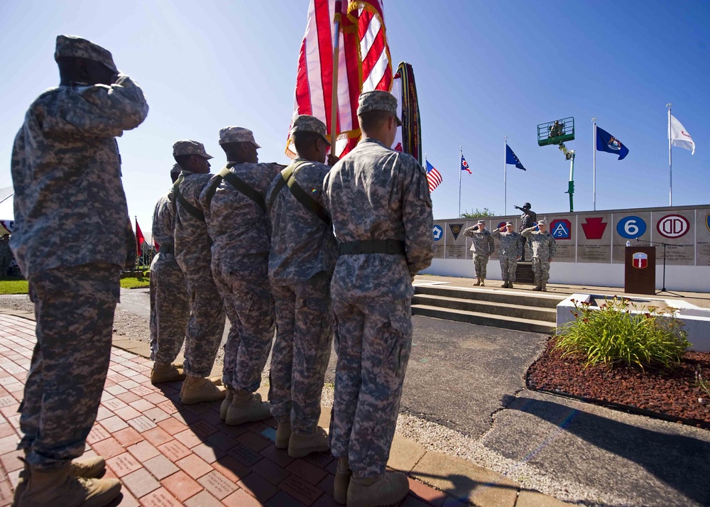 The 205th Infantry Brigade, First Army Division East Color Guard posts during the brigade's change-of-command ceremony held at the Veteran's Memorial, Camp Atterbury Joint Maneuver Training Center in central Indiana June 30.