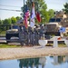The 205th Infantry Brigade, First Army Division East Color Guard stands posted during the brigade's change-of-command ceremony held at the Veteran's Memorial, Camp Atterbury Joint Maneuver Training Center in central Indiana June 30.