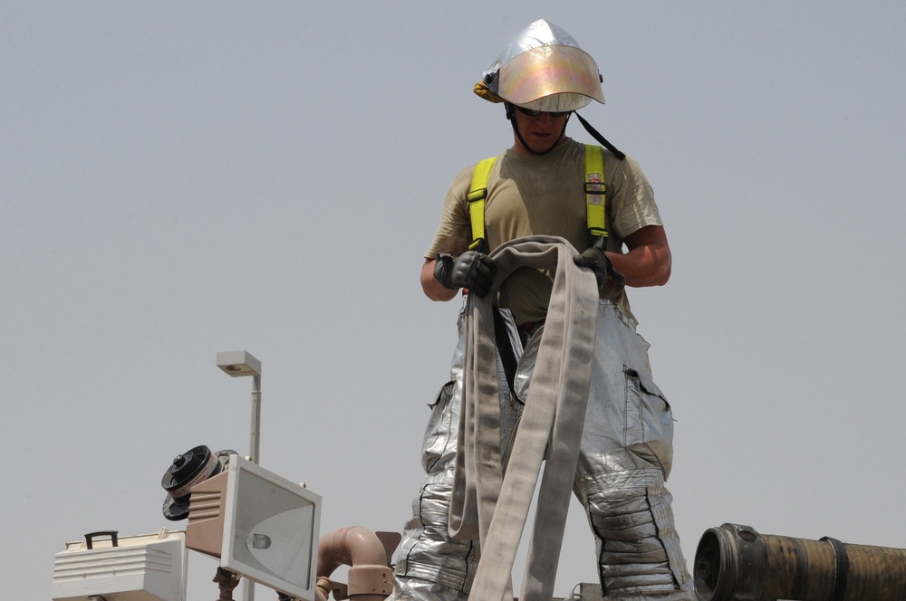 Deployed Fire Dogs Respond To, Extinguish Structure Fire