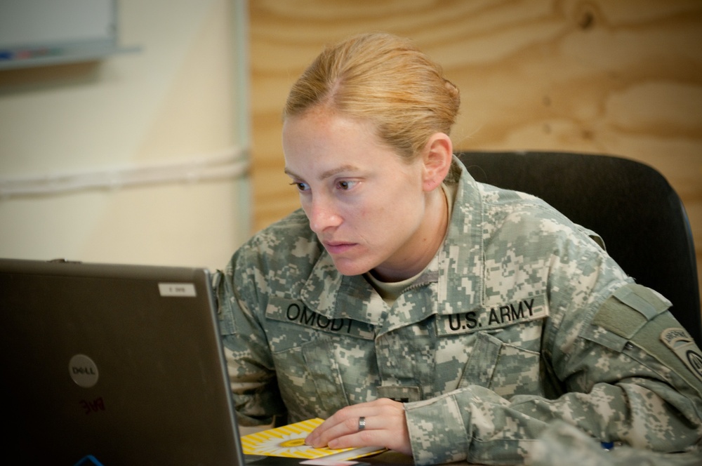 Deskbound helo pilot provides critical skills during drawdown