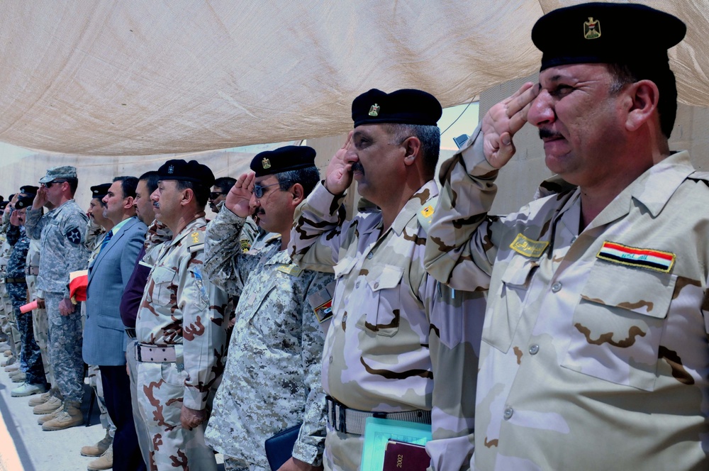 Strykers sign over their final base to Iraqi army