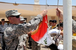 Strykers sign over their final base to Iraqi army