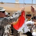 Strykers sign over their final base to Iraqi army