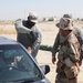 2-3 FA trains Kurdish Regional Guard on how to conduct traffic control point searches.