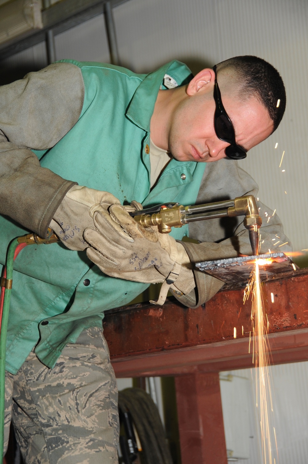 Extreme Heat, Hectic Flightline Keep 380th EMXS Maintainers Busy