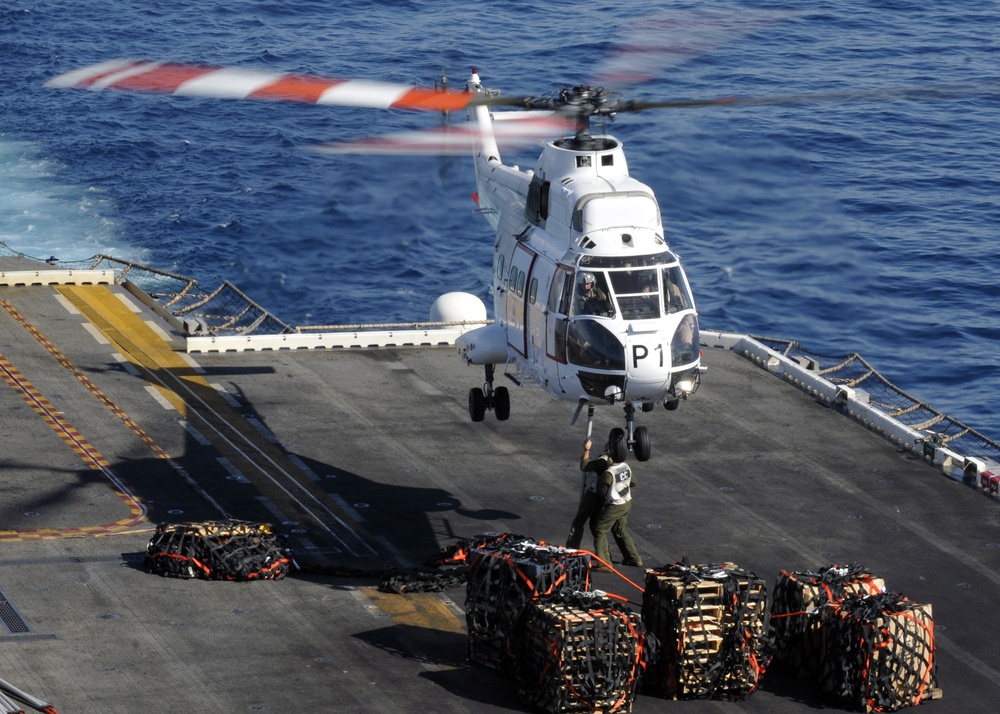 Helicopters carry supplies