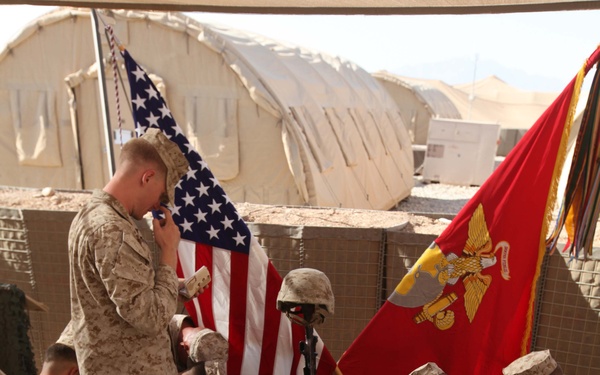 Police Mentor is honored at memorial service aboard Delaram II