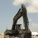 Guardsmen reinforce rock wall along Caminada Pass