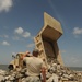 Guardsmen reinforce rock wall along Caminada Pass