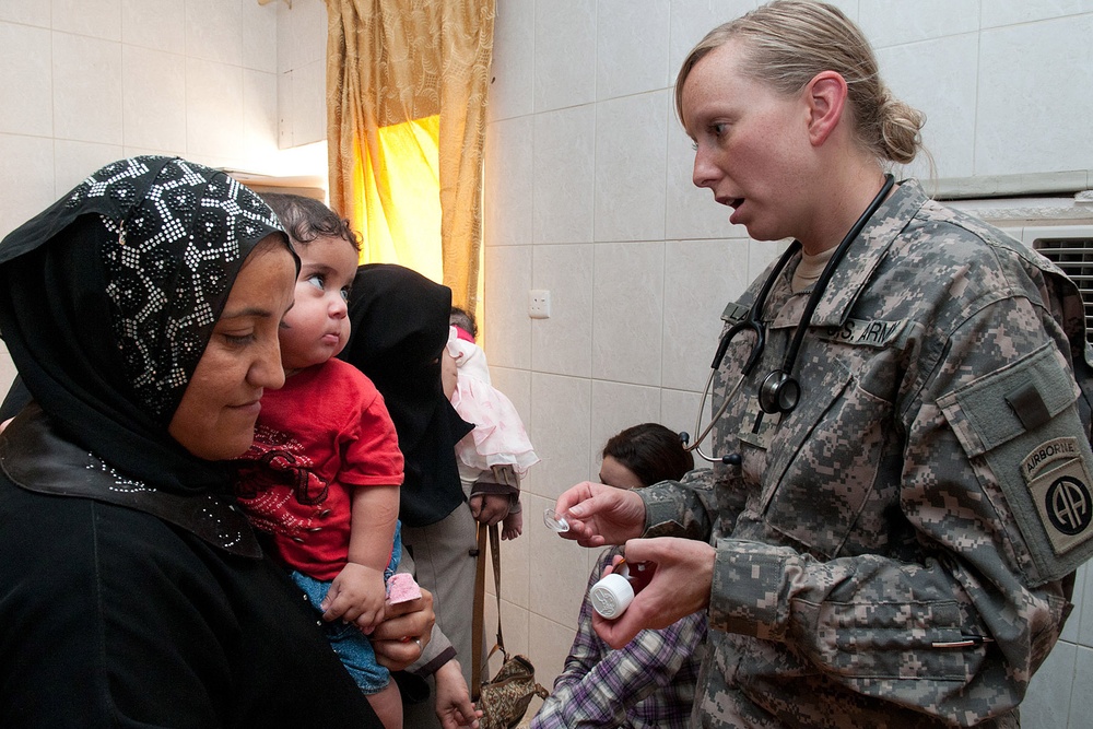 Physician assistant fulfilled by caring for deployed troops, local Iraqis
