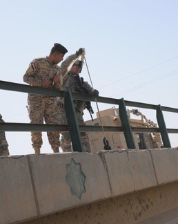 U.S., Iraqi soldiers provide safer routes, boost economy
