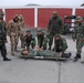 Corpsmen Teach Marines of Ten Nations How to Save Lives With Battlefield Trash