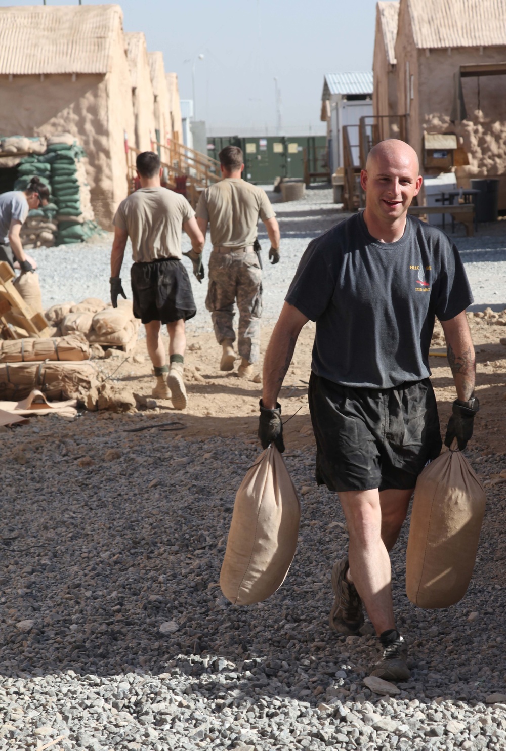 Soldiers fill sandbags for exercise