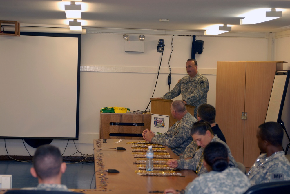 Soldiers receive their degrees while deployed