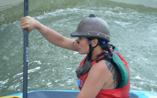 Guardmembers help wounded warriors through turbulent water