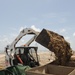 Guardsmen reinforce coastal protection barriers