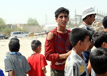 Artillerymen, policemen find thankful crowd during aid mission