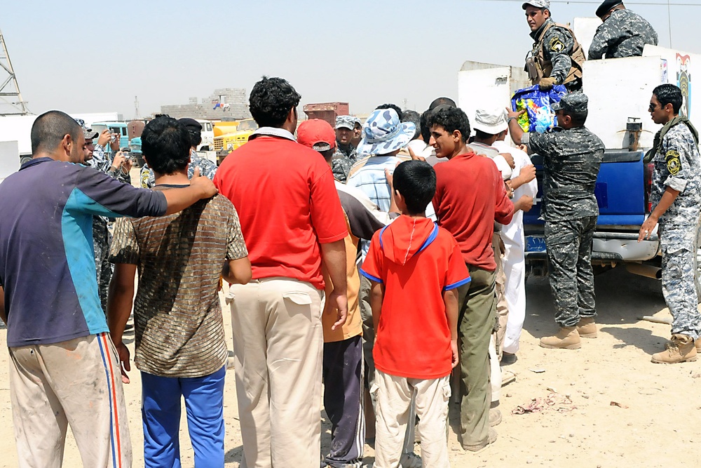 Artillerymen, policemen find thankful crowd during aid mission