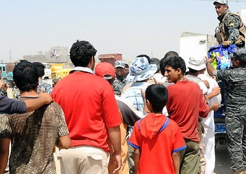 Artillerymen, policemen find thankful crowd during aid mission