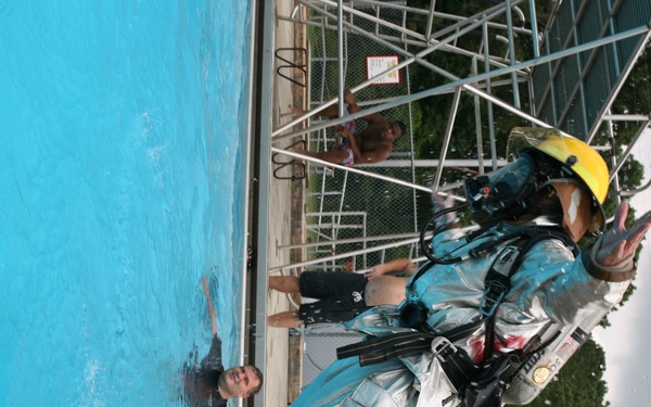 Firefighters fight panic after taking plunge