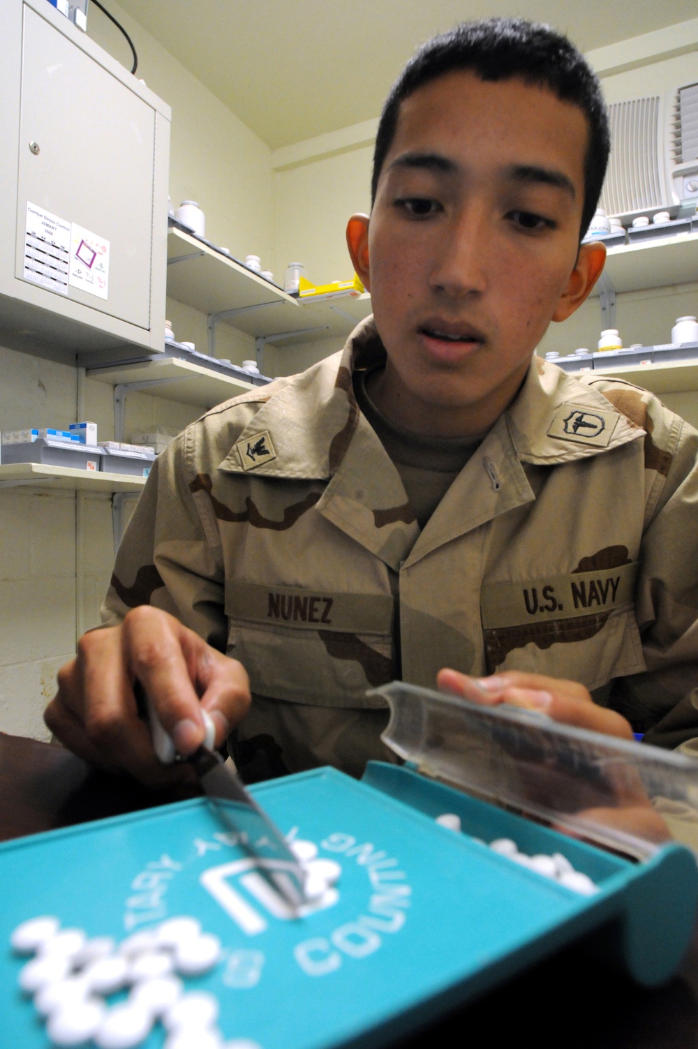 Navy Corpsman Counts Medicine