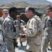 Mullen Visits No Slack, Awards Bronze Stars
