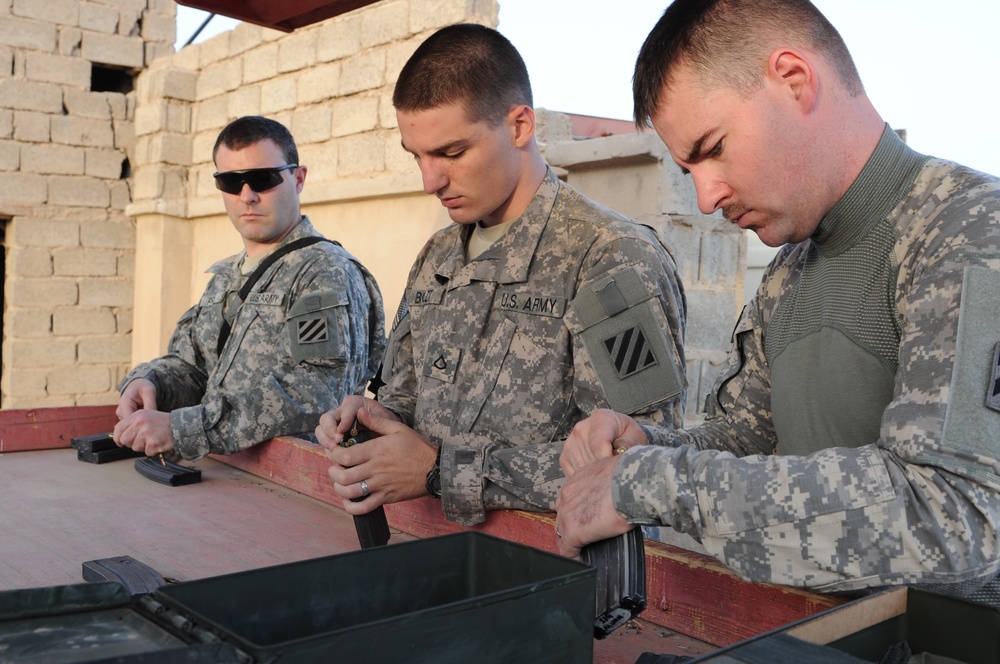 1st Advise and Assist Brigade conduct weapons qualification