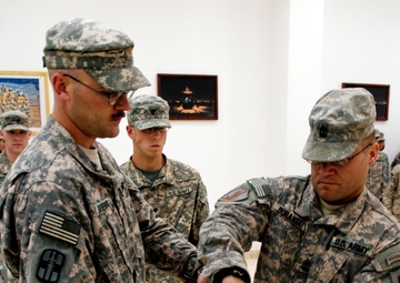 313th Medical Company cases their colors