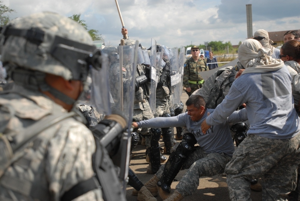 Kosovo Police and KFOR Soldiers Train Together in Riot Control Techniques