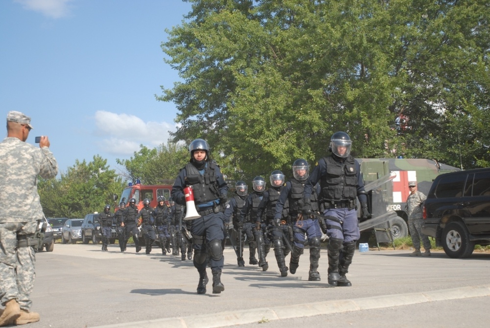 Kosovo Police and KFOR Soldiers train together in riot control techniques